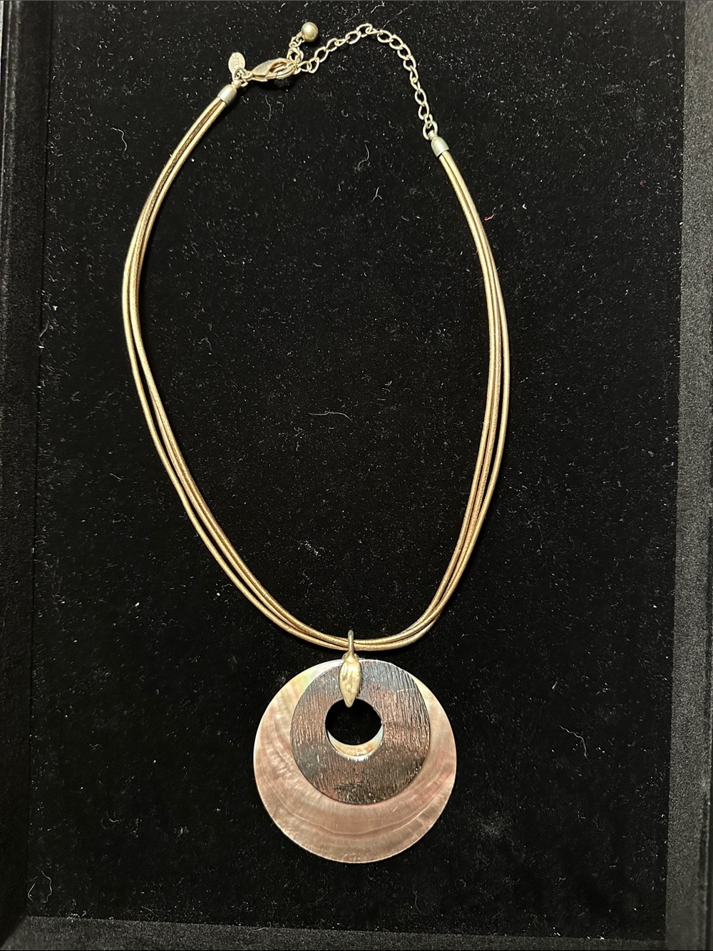 Chicos bronze cord necklace with shell pendant